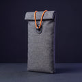 UnTrack Faraday phone sleeve, sealed with the orange cord