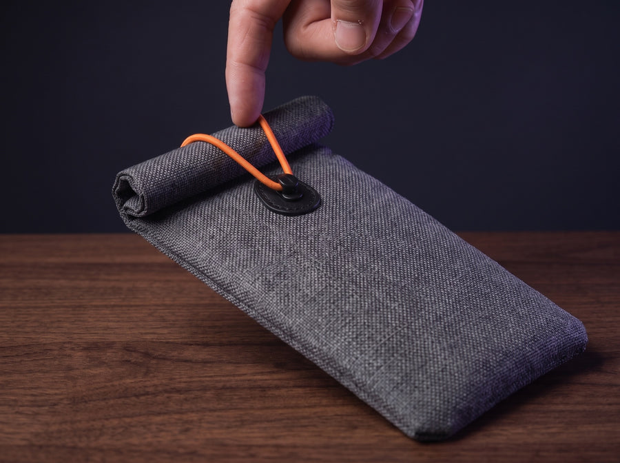 Hook the orange cord over the toggle