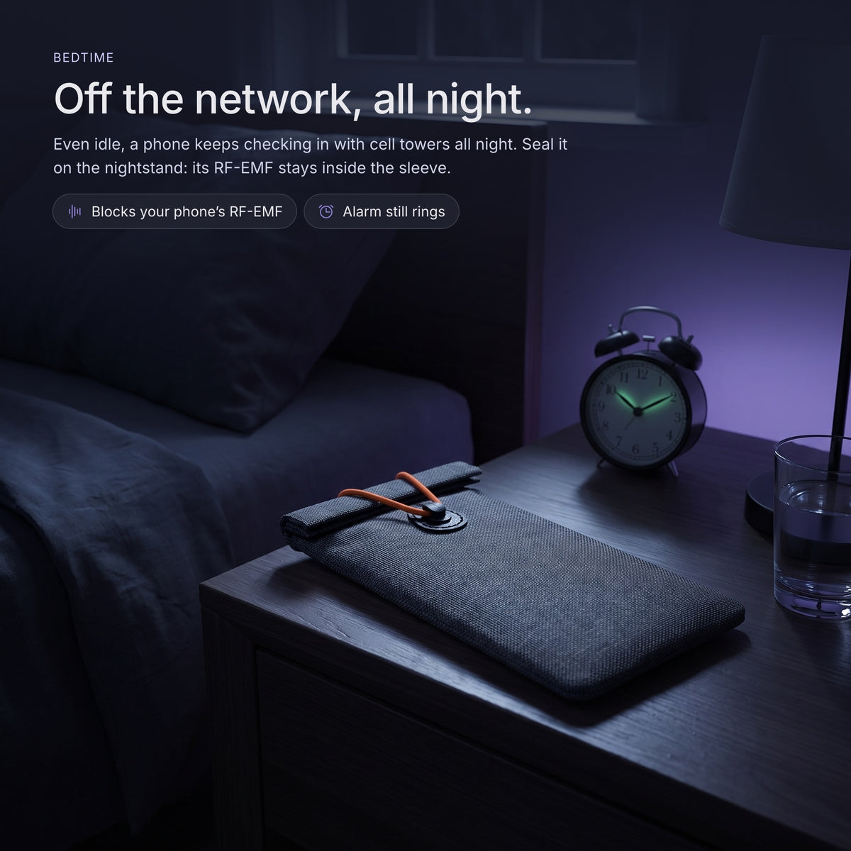 Sealed sleeve on a nightstand at night, phone off the network