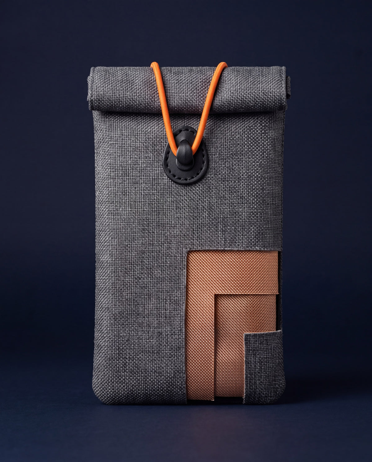 Cutaway of the UnTrack sleeve showing the woven shell and metallic shielding layers